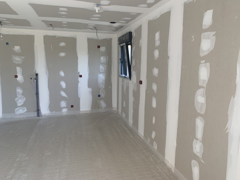 Installation d’un plancher chauffant sur 120 m² et d’une pompe à chaleur Daikin air/eau à Saint-Genis-Pouilly