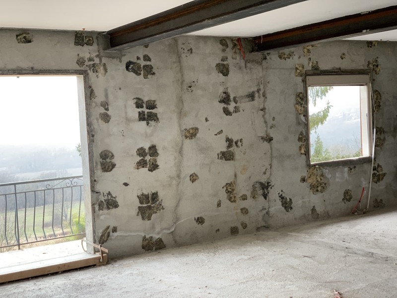 Optimisation thermique des murs avec GR32 et plafonds Placostil dans une maison à Saint-Genis-Pouilly