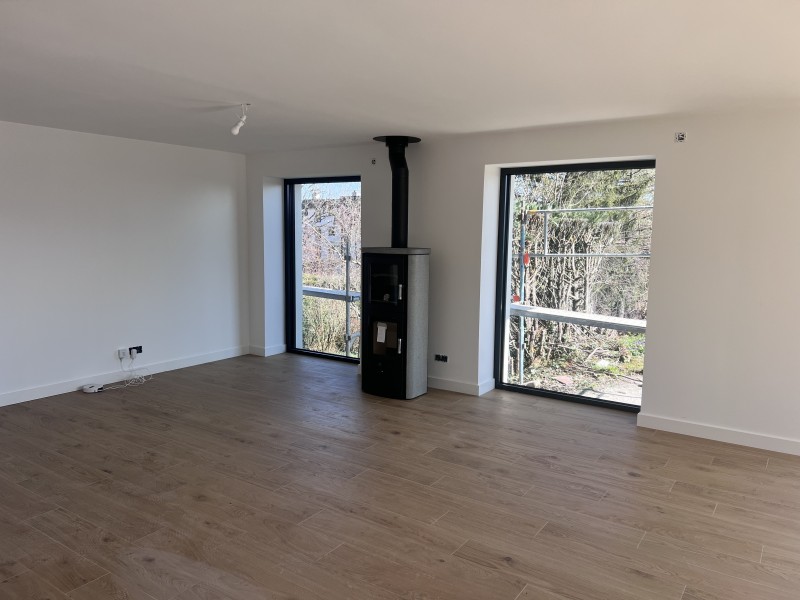 Pose de plaques BA13, cloisons Optima et laine de verre GR32 pour une isolation thermique performante à Limonest à coté de Lyon