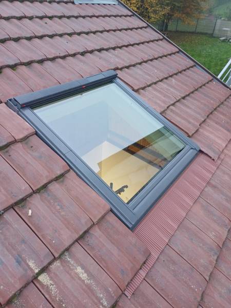 Isolation des combles et pose de velux pour améliorer l'efficacité énergétique à Meyzieu