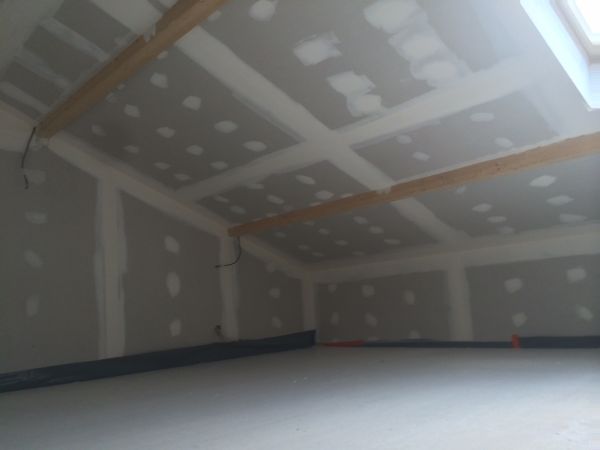 Amenagement de combles perdus avec charpente traditionnelle au Pays de Gex,combles perdus avec fermettes nous disposons de solut